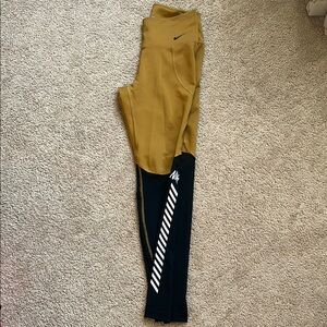 Nike Gold and Black Joggers with Dynamic Stripe